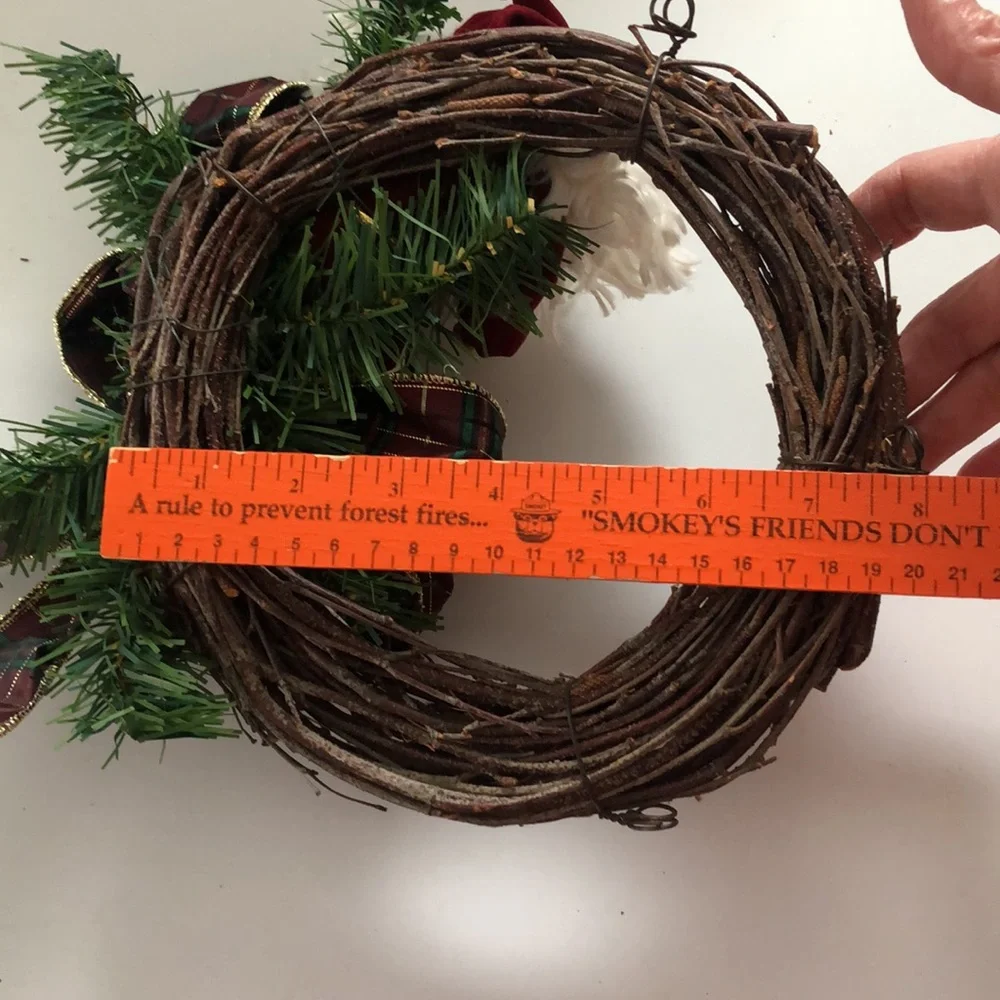 8” grapevine wreath with Santa, ribbon and greenery